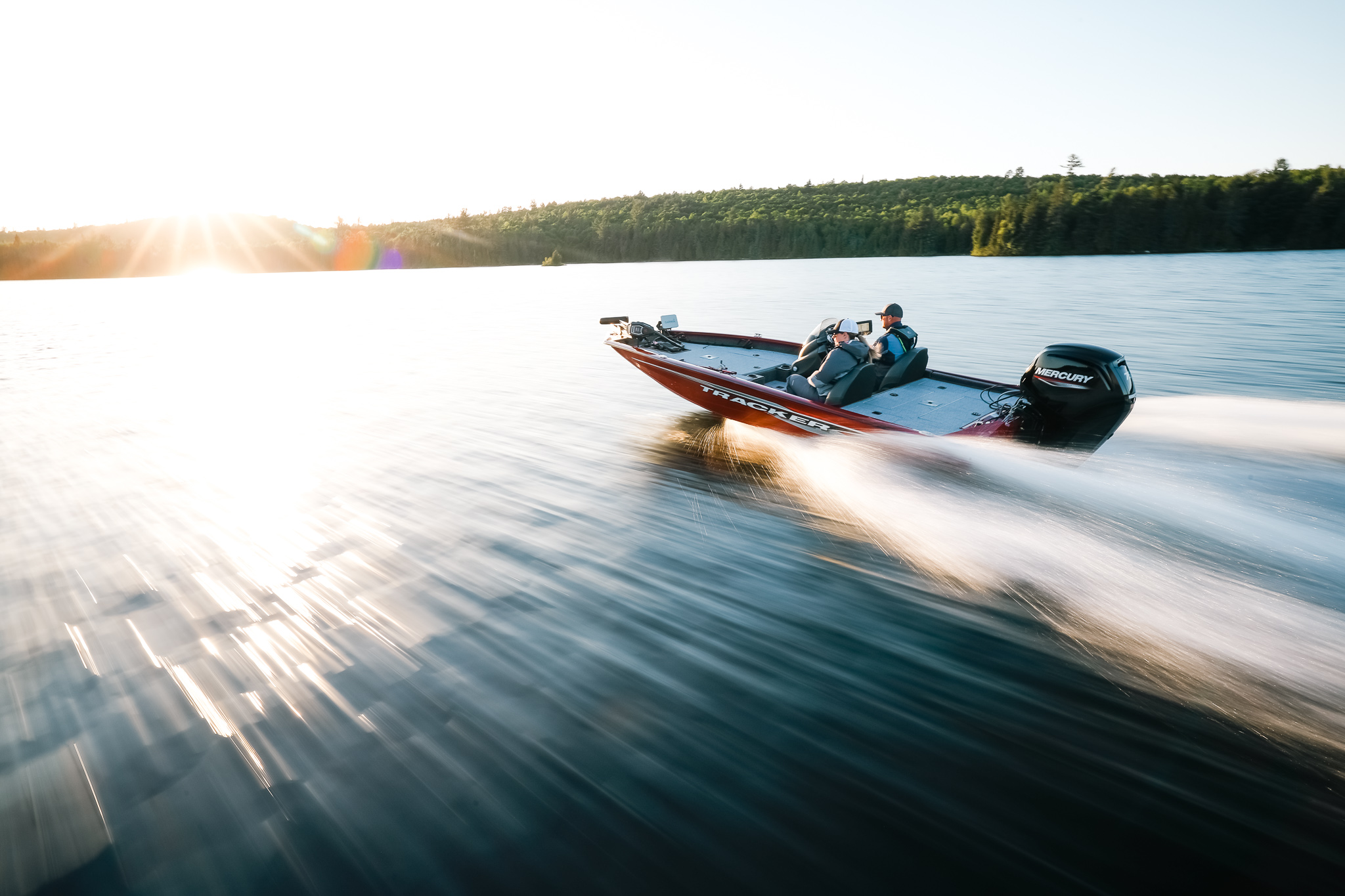 Two men on a fast jet boat on the water, avoid boating accidents concept. 