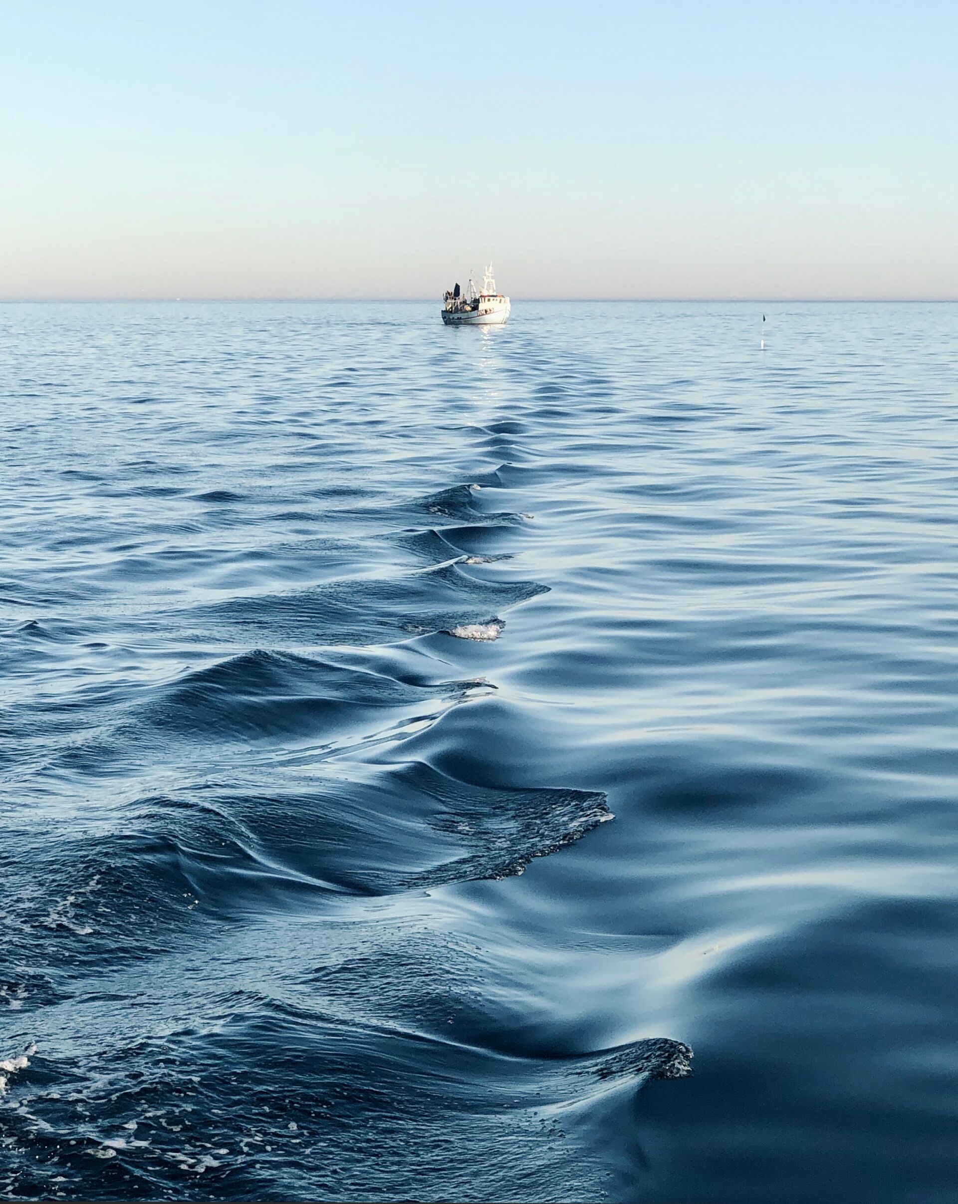 A boat on the open water, where to fish for marlin concept. 