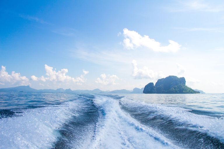 A boat wake in the water, represents cold water and watching for hypothermia symptoms