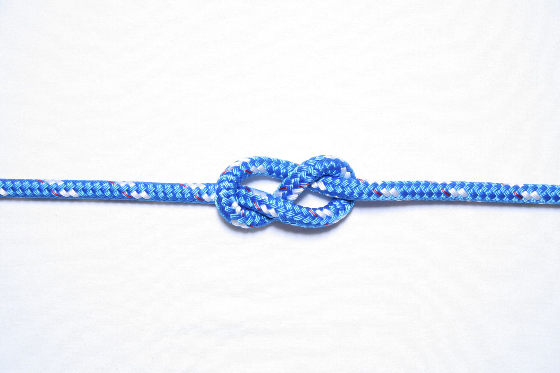 A figure eight knot on a white background. 