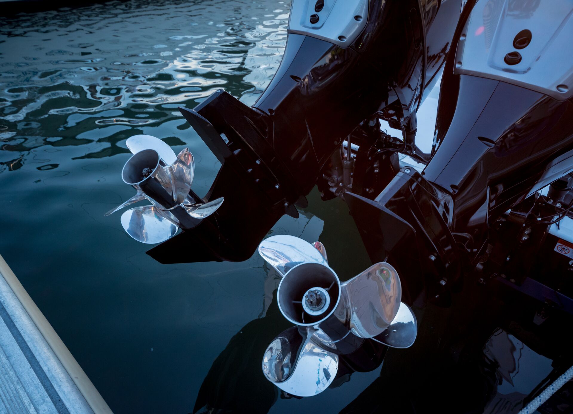 Close-up of propellers on the back of a boat, how can propeller strike accidents be avoided concept. 