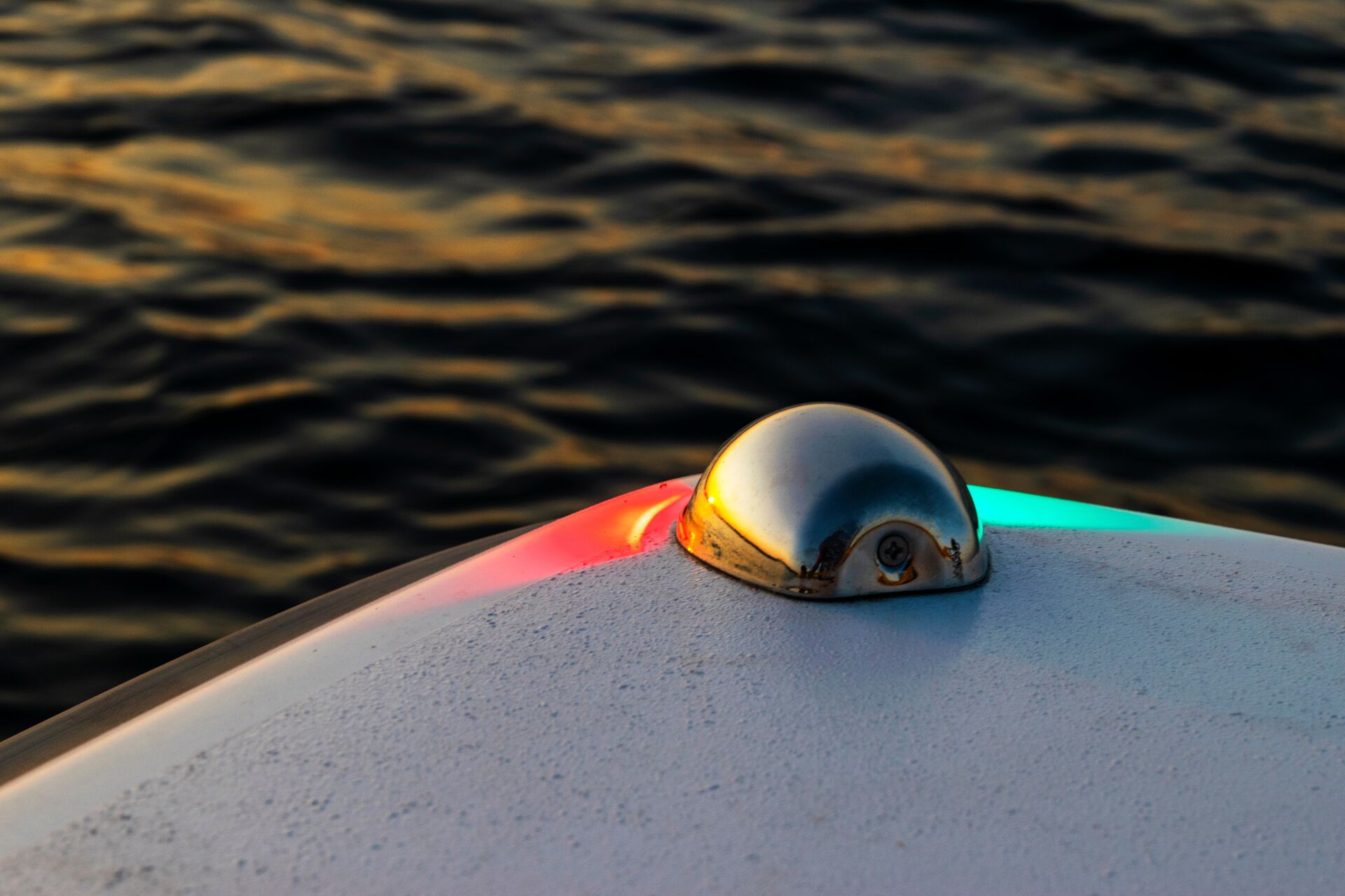 Red and green nav lights on the front of a boat, what is port and starboard on a boat concept. 