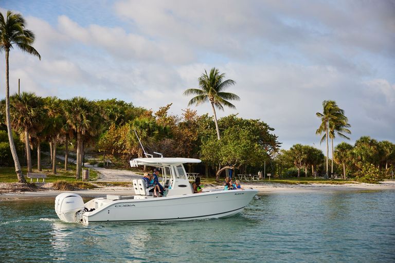 A boat's starboard side while on the water. 