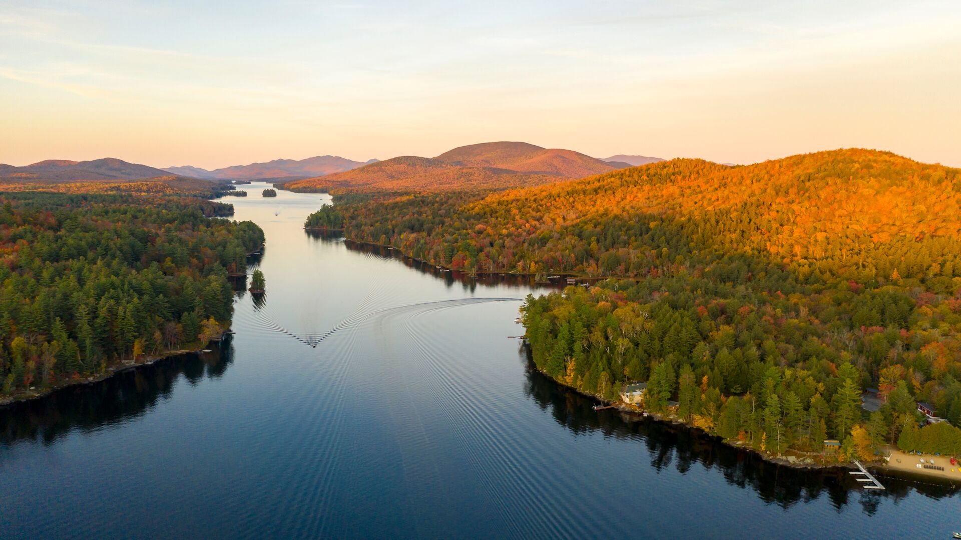 Aerial view of a waterway through the Adirondacks in New York, watercraft regulations concept. 